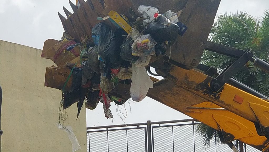 Waste being loaded on the truck